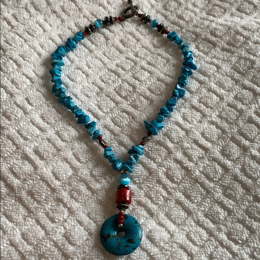 Vibrant turquoise drop stone pendant